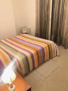 A bed or beds in a room at Alle Torri