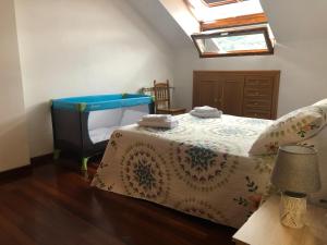 Katil atau katil-katil dalam bilik di Apartamento El Cine