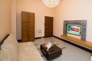 TV o dispositivi per l'intrattenimento presso 礁溪景觀溫泉會館