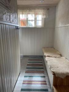 Postel nebo postele na pokoji v ubytování Järveoru