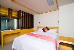 Letto o letti in una camera di 礁溪景觀溫泉會館