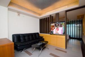 TV o dispositivi per l'intrattenimento presso 礁溪景觀溫泉會館