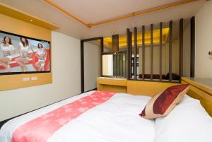 Letto o letti in una camera di 礁溪景觀溫泉會館