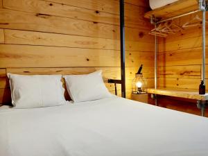 
Cama o camas de una habitación en Hostal Erasmus by gaiarooms
