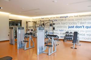 a gym with a bunch of exercise equipment at Begrand Alto Polanco Pool Gym Jacuzzi & More in Mexico City