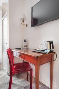 TV a/nebo společenská místnost v ubytování Courcelles Médéric