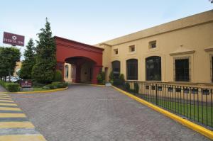 a street in front of a building at Fiesta Inn Toluca Tollocan in Toluca