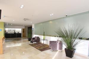 The lobby or reception area at One Culiacan Forum