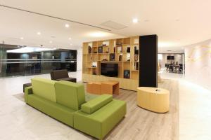 The lobby or reception area at Fiesta Inn Perinorte