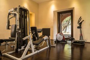 a fitness room with a gym with tread machines at Fiesta Americana Hacienda San Antonio El Puente Cuernavaca in Cuernavaca