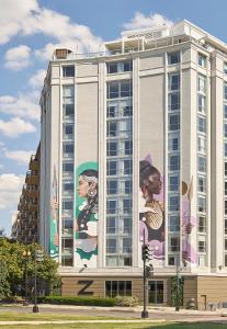 a building with paintings on the side of it at Hotel Zena, a Viceroy Urban Retreat in Washington, D.C.