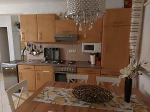 Kuchyň nebo kuchyňský kout v ubytování Apartment Vila Lina + 33 fotografií