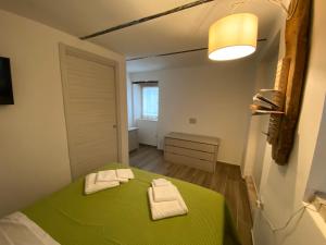 Posteľ alebo postele v izbe v ubytovaní Agriturismo Casa Orsini