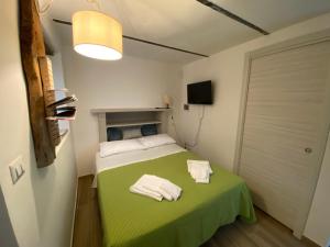 Posteľ alebo postele v izbe v ubytovaní Agriturismo Casa Orsini