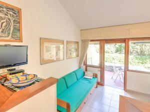 TV a/nebo společenská místnost v ubytování Beachside Holiday home in Punta Ala + 33 fotografií