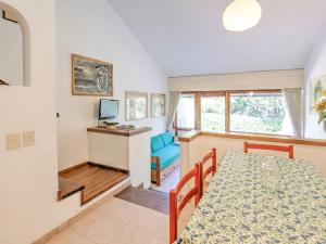 A bed or beds in a room at Holiday Home in Punta Ala by the Sea