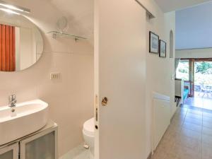 A bathroom at Holiday Home in Punta Ala by the Sea