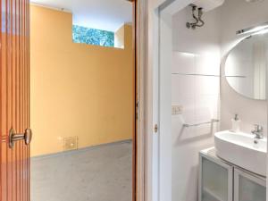 A bathroom at Holiday Home in Punta Ala by the Sea