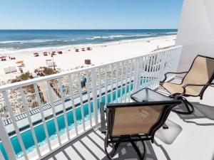 a balcony with a view of the beach and the ocean at Windemere Condominiums in Perdido Key