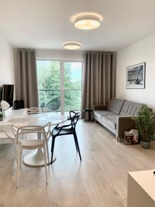 Posedenie v ubytovaní Apartamenty Sunrise Kolobrzeg Podczele