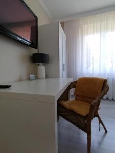 Televizors / izklaižu centrs naktsmītnē Apartament Leśny