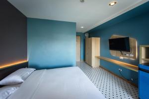 TV a/nebo společenská místnost v ubytování The Feeling Hotel