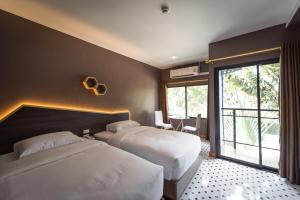 Foto da galeria de The Feeling Hotel em Rayong