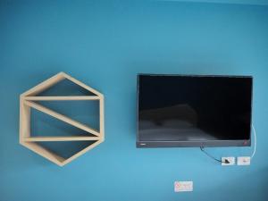 TV a/nebo společenská místnost v ubytování The Feeling Hotel