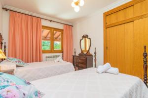 Cama o camas de una habitación en Villa Ginebro