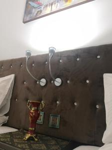 Postel nebo postele na pokoji v ubytování Aryaf Nizwa Hotel Apartments