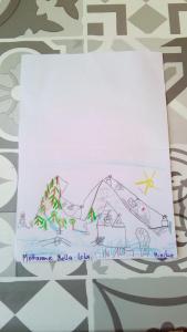 a drawing of a mountain on a sheet of paper at B&B il Pisolo Di Meina in Meina
