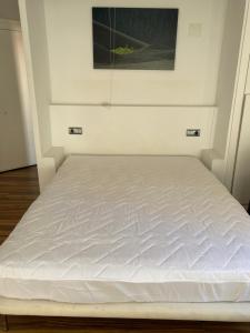 Postel nebo postele na pokoji v ubytování Cosy Apartment - La Manga, km 7
