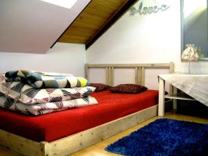 a bed with pillows on it in a room at Trend Apartments Old Market Rynek Rzeszów 84m2! in Rzeszów