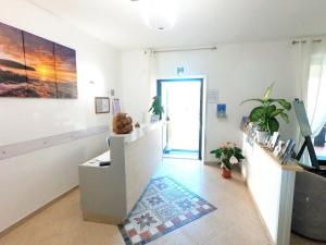 TV a/nebo společenská místnost v ubytování Hotel Aurora