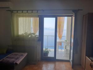 Postel nebo postele na pokoji v ubytování Apartman Ada