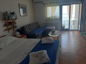 Postel nebo postele na pokoji v ubytování Apartman Ada