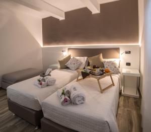 Posteľ alebo postele v izbe v ubytovaní Angel's Care B&B