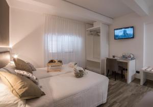 Posteľ alebo postele v izbe v ubytovaní Angel's Care B&B