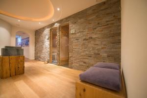 Posezení v ubytování Alpines Gourmet Hotel Montanara
