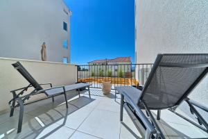 Balkón alebo terasa v ubytovaní Modern apartments with sea view 150 meters to beach