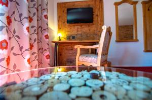 TV a/nebo společenská místnost v ubytování Hotel Blumental