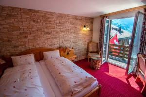 Postel nebo postele na pokoji v ubytování Hotel Blumental