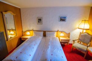 Postel nebo postele na pokoji v ubytování Hotel Blumental