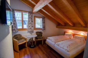 Postel nebo postele na pokoji v ubytování Hotel Blumental