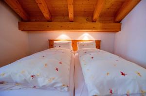 Postel nebo postele na pokoji v ubytování Hotel Blumental