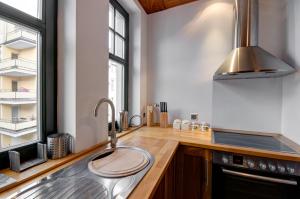 Kuchyňa alebo kuchynka v ubytovaní Apartament Haffnera 10