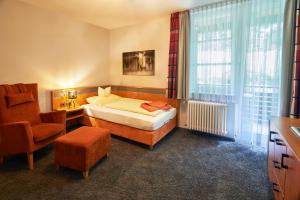 Postel nebo postele na pokoji v ubytování Ferien Residenz Bergfried