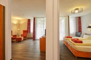 Postel nebo postele na pokoji v ubytování Ferien Residenz Bergfried