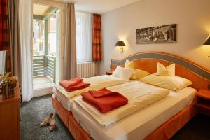 Postel nebo postele na pokoji v ubytování Ferien Residenz Bergfried