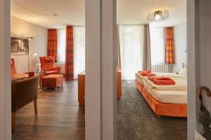 Postel nebo postele na pokoji v ubytování Ferien Residenz Bergfried